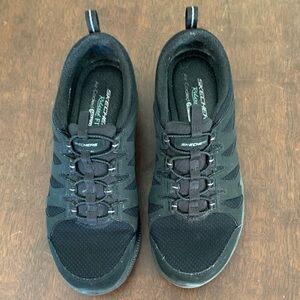 Women’s black Skechers size 8